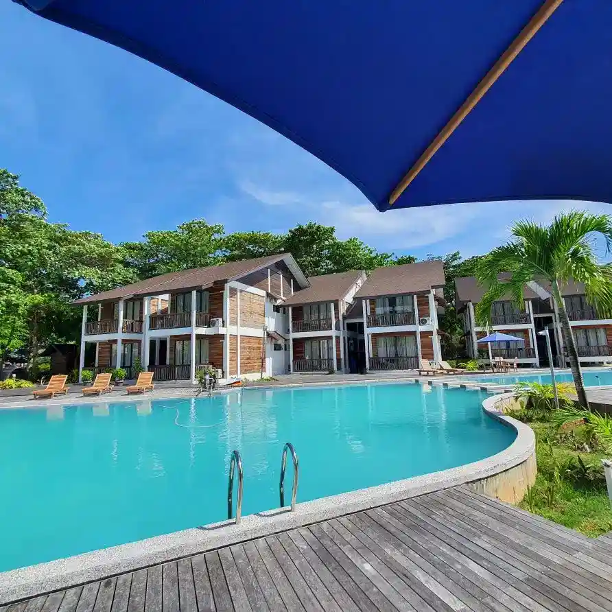 Luxurious Pool Villa with its private swimming pool at Borneo Divers Mabul Resort in Sabah, surrounded by tropical gardens.